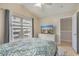 Bedroom with a ceiling fan, large windows and television at 2701 Kashton Dr., Myrtle Beach, SC 29577