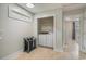 Bright laundry room featuring modern washer and dryer, with convenient storage at 2701 Kashton Dr., Myrtle Beach, SC 29577