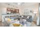 Comfortable living room with modern furniture, stylish decor, with open concept into the kitchen at 2701 Kashton Dr., Myrtle Beach, SC 29577