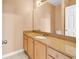 Bathroom featuring granite counters and wooden cabinetry at 2876 Howard Ave. # C, Myrtle Beach, SC 29577