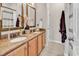 Bathroom featuring a double sink vanity with granite countertops at 2876 Howard Ave. # C, Myrtle Beach, SC 29577