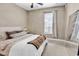 Bright bedroom with a ceiling fan, large window, and plush carpet at 2876 Howard Ave. # C, Myrtle Beach, SC 29577