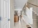 Entryway with stairs, tile flooring, and open view of the kitchen and living area at 2876 Howard Ave. # C, Myrtle Beach, SC 29577
