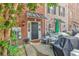 Inviting townhome entrance featuring a cozy outdoor seating area at 2876 Howard Ave. # C, Myrtle Beach, SC 29577