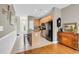 Well-lit kitchen featuring tile floors, island, and stainless steel appliances at 2876 Howard Ave. # C, Myrtle Beach, SC 29577
