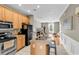 Kitchen with granite counters, island, and stainless appliances open to the living area at 2876 Howard Ave. # C, Myrtle Beach, SC 29577