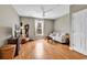 Bright living room with hardwood floors, ceiling fan, and natural light at 2876 Howard Ave. # C, Myrtle Beach, SC 29577