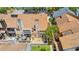 Aerial view of townhome with a patio, overlooking the brown shingled roof with chimneys at 310 74Th Ave. N # 7, Myrtle Beach, SC 29572