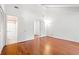 Bright bedroom with hardwood floors, closet, and a bathroom with shower/tub combination at 310 74Th Ave. N # 7, Myrtle Beach, SC 29572