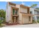 Charming two-story townhouse featuring a unique design, well-maintained landscaping, and inviting front entrance at 310 74Th Ave. N # 7, Myrtle Beach, SC 29572