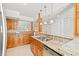 Well-equipped kitchen with stainless steel appliances, granite countertops, and ample cabinet space at 310 74Th Ave. N # 7, Myrtle Beach, SC 29572