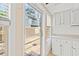 Room featuring a window, built-in storage space and exterior access to a patio at 310 74Th Ave. N # 7, Myrtle Beach, SC 29572