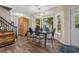 Light and airy dining room with hardwood floors and large windows overlooking the backyard at 311 Ashwood Ln., Myrtle Beach, SC 29588