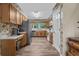 Traditional kitchen featuring oak cabinets, modern appliances, and ample counter space at 311 Ashwood Ln., Myrtle Beach, SC 29588