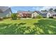 Spacious backyard with patio seating and green grass at 3154 Shorecrest Bay Dr., Murrells Inlet, SC 29576