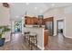 Open kitchen featuring wooden cabinetry, stainless steel appliances, breakfast bar, and recessed lighting at 3154 Shorecrest Bay Dr., Murrells Inlet, SC 29576