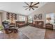 Spacious living room with vaulted ceilings, ceiling fan, hardwood floors, and plenty of natural light at 3154 Shorecrest Bay Dr., Murrells Inlet, SC 29576