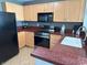 Cozy kitchen featuring stainless steel appliances, wooden cabinets, and a contrasting countertop, perfect for cooking at 3601 N Ocean Blvd. # 1139, North Myrtle Beach, SC 29582