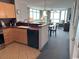 Open-concept kitchen with modern appliances seamlessly connected to a living area with an amazing view at 3601 N Ocean Blvd. # 1139, North Myrtle Beach, SC 29582