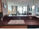 Bright and modern kitchen featuring an island counter and an open view of the living area and beautiful ocean views at 3601 N Ocean Blvd. # 1139, North Myrtle Beach, SC 29582