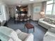 Spacious living room open to kitchen and dining area at 3601 N Ocean Blvd. # 1139, North Myrtle Beach, SC 29582