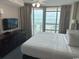 Relaxing main bedroom with private balcony access and ocean views at 3601 N Ocean Blvd. # 1139, North Myrtle Beach, SC 29582