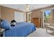 This is a bedroom with a large window, and built in closets, and carpet flooring at 3975 River Hills Dr., Little River, SC 29566