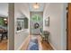 An open foyer with beautiful hardwood floors, a view into the dining room, and an inviting atmosphere at 3975 River Hills Dr., Little River, SC 29566