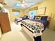 Bright bedroom with two beds, quilt bedspreads, and coastal decor at 404 29Th Ave. N, North Myrtle Beach, SC 29582