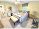 Bedroom with white carpet, queen bed, a vanity, and closet at 404 29Th Ave. N, North Myrtle Beach, SC 29582