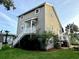 Quaint beach house with a charming exterior, surrounded by lush greenery at 404 29Th Ave. N, North Myrtle Beach, SC 29582