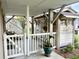 Outdoor area with a charming wood-paneled shower house and gated entrance at 404 29Th Ave. N, North Myrtle Beach, SC 29582