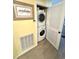 Conveniently stacked washer and dryer in an easily accessible closet at 404 29Th Ave. N, North Myrtle Beach, SC 29582