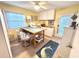 Bright office space with a sewing machine, crafting table, and plenty of storage at 404 29Th Ave. N, North Myrtle Beach, SC 29582