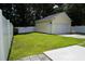 Large, private backyard featuring a detached garage and a new fence at 433 Emerson Dr., Myrtle Beach, SC 29579