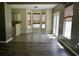 Bright dining area with tile flooring, large windows and back yard access at 433 Emerson Dr., Myrtle Beach, SC 29579