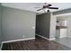 Open-concept living area with modern flooring, flowing into a dining area with kitchen views at 433 Emerson Dr., Myrtle Beach, SC 29579