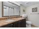 Well-appointed bathroom featuring a double sink vanity with granite countertops and modern fixtures at 4800 Ocean Blvd. S # 1119, North Myrtle Beach, SC 29582