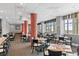 Well-lit restaurant/dining area with seating for numerous people and large windows at 4800 Ocean Blvd. S # 1119, North Myrtle Beach, SC 29582