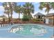 Community hot tub, with nearby gazebo, surrounded by tropical plants at 4800 Ocean Blvd. S # 1119, North Myrtle Beach, SC 29582