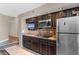 Well-equipped kitchen featuring stainless steel appliances, granite countertops, and custom cabinetry at 4800 Ocean Blvd. S # 1119, North Myrtle Beach, SC 29582