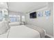 Relaxing bedroom with two beds, TV, coastal decor, and view to the ocean at 4800 S Ocean Blvd. # 520, North Myrtle Beach, SC 29582