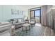 Living room with comfortable seating and an ocean view at 4800 S Ocean Blvd. # 520, North Myrtle Beach, SC 29582