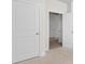 Bedroom featuring neutral carpet flooring, a closet, and open entryways at 490 Calhoun Falls Dr., Myrtle Beach, SC 29579