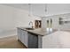 Spacious kitchen island with granite countertop, stainless steel sink, and ample storage at 490 Calhoun Falls Dr., Myrtle Beach, SC 29579