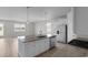 Open kitchen design featuring a large island, stainless appliances, and bright natural light at 490 Calhoun Falls Dr., Myrtle Beach, SC 29579