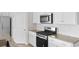 Kitchen featuring stainless steel appliances, granite countertops, and a stylish tile backsplash at 490 Calhoun Falls Dr., Myrtle Beach, SC 29579