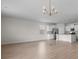 Open concept living area with hardwood floors, bright lighting, and modern kitchen view at 490 Calhoun Falls Dr., Myrtle Beach, SC 29579