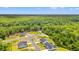 Picturesque aerial view shows the community surrounded by vast green space and a nearby waterway at 5004 Shore Breeze Dr., Myrtle Beach, SC 29588