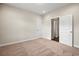 Bedroom with carpet, white trim, and white doors at 5004 Shore Breeze Dr., Myrtle Beach, SC 29588